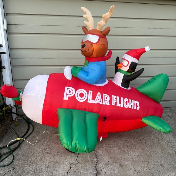 Amazon.com: Gemmy Animated Polar Flights Airplane Christmas  Gemmy Animated Polar Flights Airplane Christmas Inflatable Reindeer & Penguin